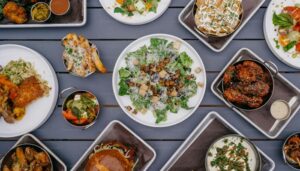 Plates with various meals on a table representing per diem rates and meal allowances in Slovakia
